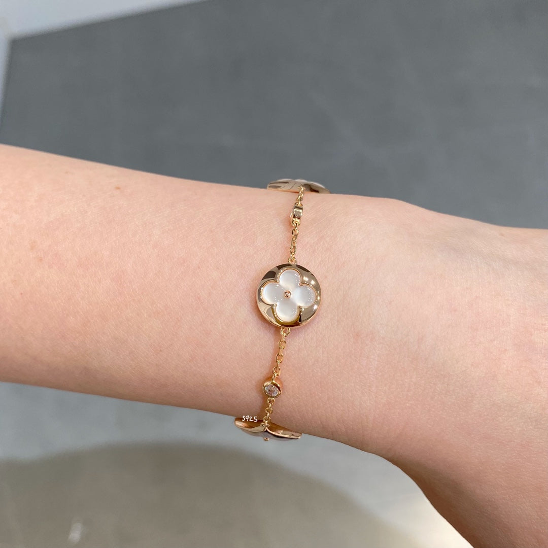 ¡®Loco¡¯STAR AND SUN 4 MOTIF WHITE MOP PINK GOLD BRACELET